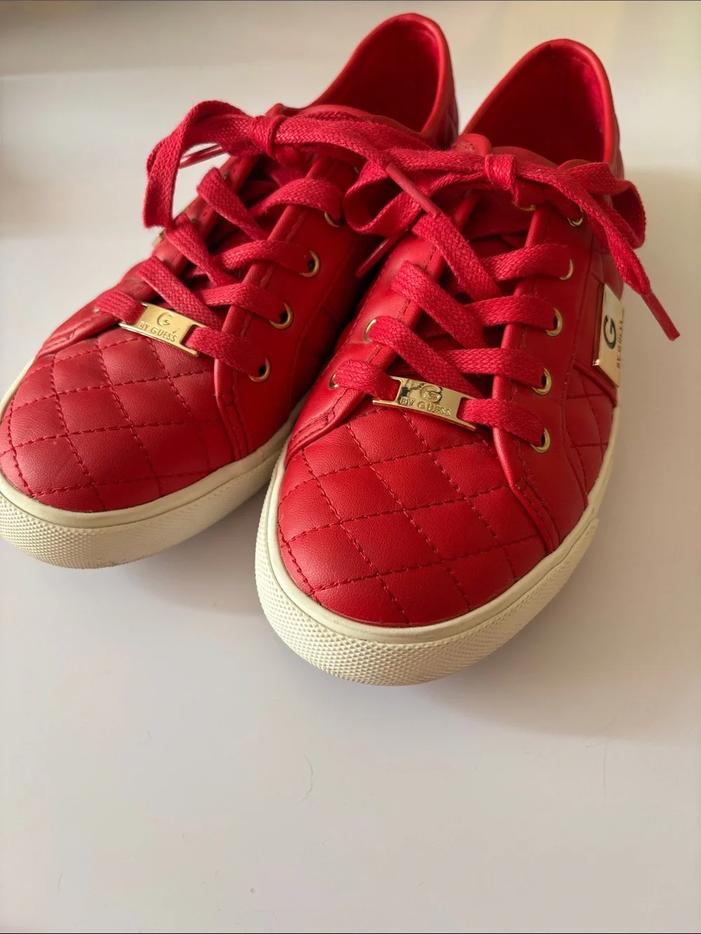 GUESS size 7.5 red quilted leather Sneakers with Gold Hardware very good shape